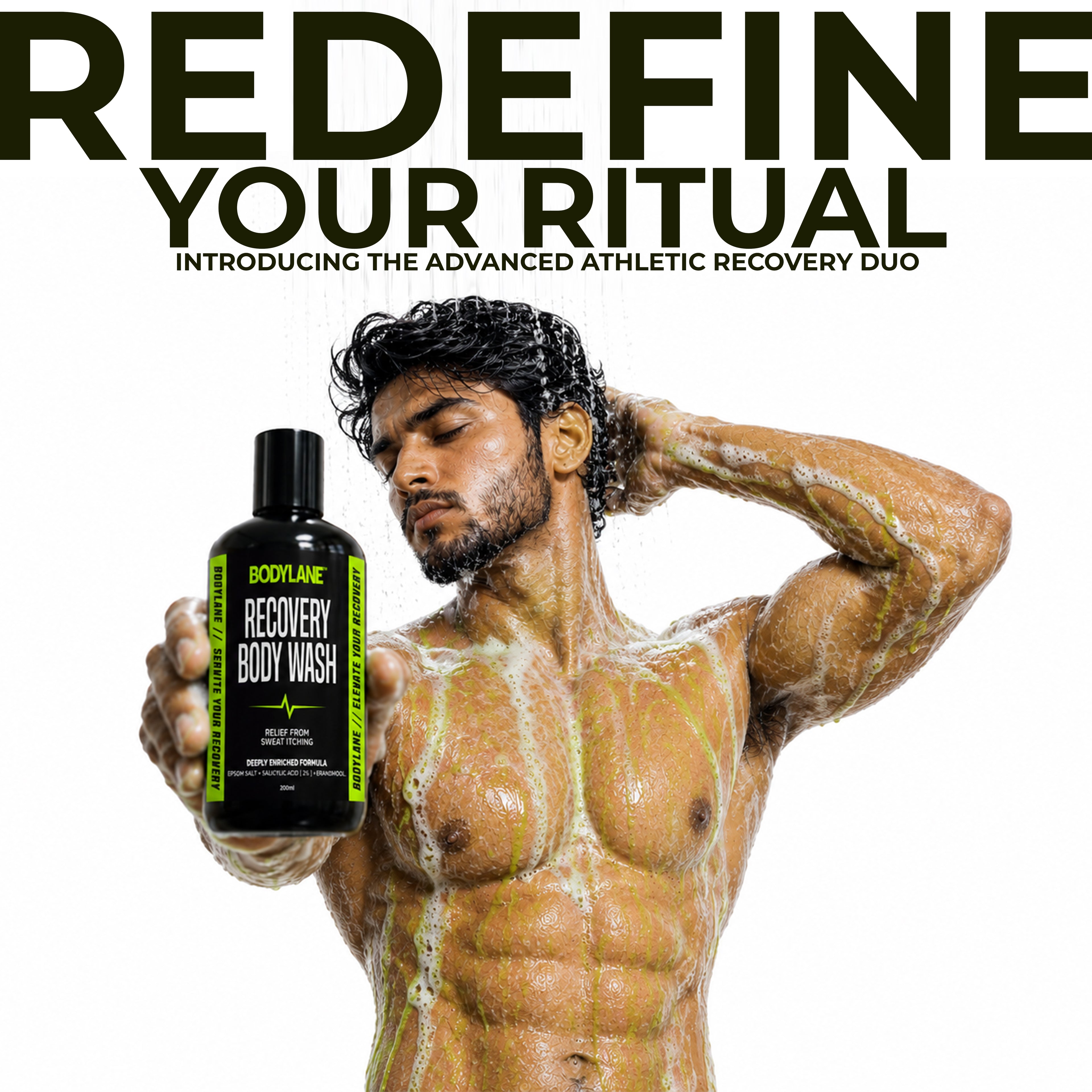 Man with soap suds holding a bottle of Bodylane Recovery Body Wash with text 'Redefine Your Ritual' on a white background.