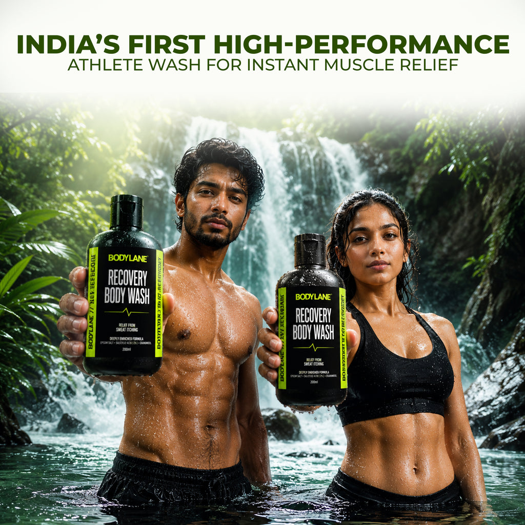 Two people holding Body Lane Recovery Body Wash bottles with a waterfall background